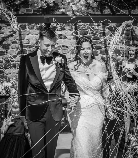The streamer & confetti moment after the ceremony