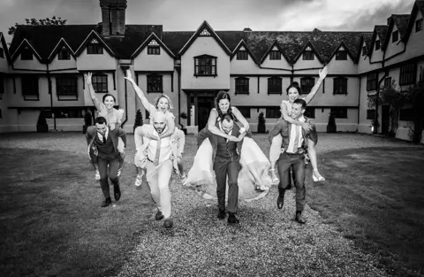 The groomsmen and bridesmaids celebrate!