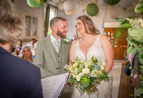 Bride and Groom smiling during Kent Life Wedding Ceremony