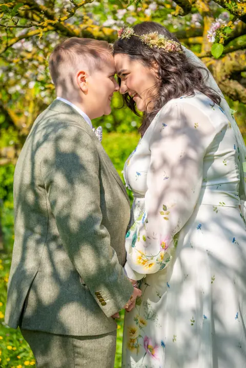 Two brides celebrate amongst the trees